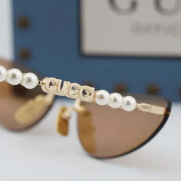 Gucci GG1920S 001 Cat Eye Sunglasses - Shiny Gold with White Pearl/Grey Gucci GG1920S Rimless Cat Eye Pearl Sunglasses – Designer  main image 3